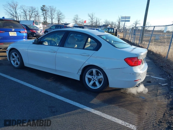 2014 BMW 3 Series 328i xDrive with VIN WBA3B5G58ENS08415, listed as a IAAI auction lot 41642668 with 51,563 mi miles and . Bid and sale history available at DreamBid. Image 3.