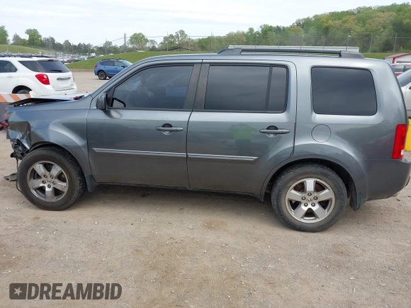 2011 Honda Pilot EX-L z VIN 5FNYF4H69BB090819, wystawiony jako IAAI lot #42061097 z przebiegiem 207 062 mil mil oraz . Historia ofert i sprzedaży dostępna na DreamBid. Obrazek 14.