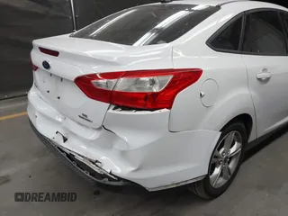 2014 Ford Focus SE with VIN 1FADP3F22EL437727, listed as a IAAI auction lot 42001593 with 90,814 mi miles. Bid and sale history available at carsss.com. Image 6.