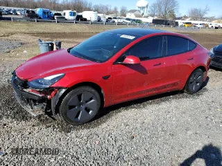 2022 Tesla Model 3 with VIN 5YJ3E1EA5NF184785, listed as a Copart auction lot 49466575 with 85,273 mi miles and Salvage Title. Bid and sale history available at DreamBid. Image 1.