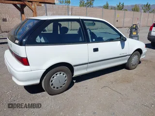 1992 Geo Metro z VIN 2C1MR2460N6771460, wystawiony jako IAAI lot #41862209 z przebiegiem 62 627 mil mil oraz . Historia ofert i sprzedaży dostępna na DreamBid. Obrazek 4.