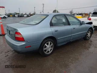 1994 Honda Accord EX w/Leather with VIN 1HGCD5657RA119657, listed as a IAAI auction lot 41528165 with 119,458 mi miles. Bid and sale history available at carsss.com. Image 4.