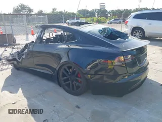 2022 Tesla Model S Plaid z VIN 5YJSA1E64NF477659, wystawiony jako IAAI lot #42358072 z przebiegiem Nie podano mil oraz . Historia ofert i sprzedaży dostępna na DreamBid. Obrazek 3.