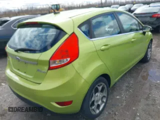 2011 Ford Fiesta SES with VIN 3FADP4FJ7BM131503, listed as a IAAI auction lot 41804351 with 233,620 mi miles. Bid and sale history available at carsss.com. Image 4.