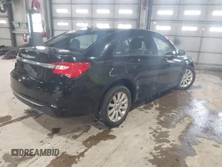2013 Chrysler 200 Touring with VIN 1C3CCBBB6DN501373, listed as a IAAI auction lot 41587159 with 193,410 mi miles and . Bid and sale history available at DreamBid. Image 4.