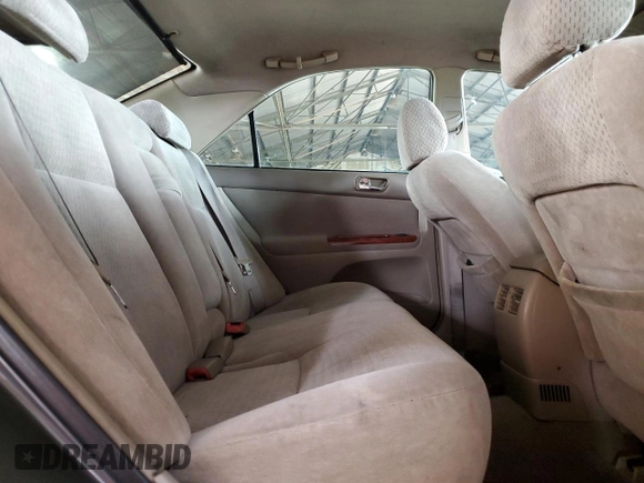2004 Toyota Camry LE with VIN 4T1BE32K74U884720, listed as a Copart auction lot 49534195 with 253,516 mi miles and Salvage Title. Bid and sale history available at DreamBid. Image 10.