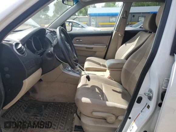 2013 Suzuki Grand Vitara Premium z VIN JS3TE0D62D4100310, wystawiony jako Copart lot #54916065 z przebiegiem 116 428 mil mil oraz Szkoda całkowita • Salvage title. Historia ofert i sprzedaży dostępna na DreamBid. Obrazek 7.