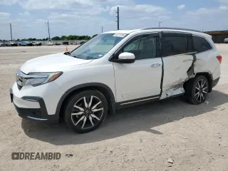 2019 Honda Pilot Touring 8-Passenger z VIN 5FNYF5H92KB030641, wystawiony jako Copart lot #53270785 z przebiegiem 115 919 mil mil oraz Szkoda całkowita • Salvage title. Historia ofert i sprzedaży dostępna na DreamBid. Obrazek 1.