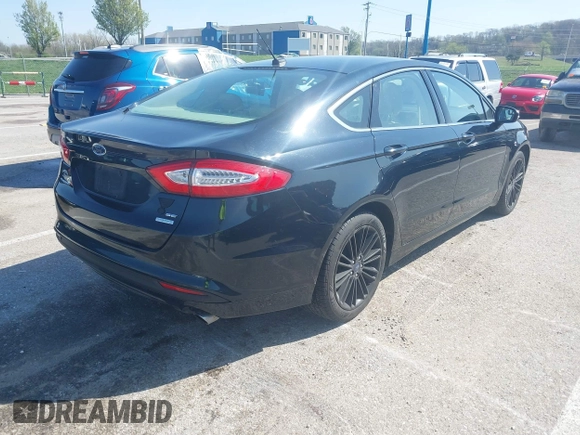2014 Ford Fusion SE with VIN 3FA6P0HD4ER291323, listed as a IAAI auction lot 41952990 with 148,583 mi miles. Bid and sale history available at carsss.com. Image 4.