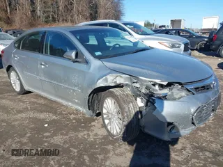 2015 Toyota Avalon Hybrid XLE Touring with VIN 4T1BD1EB5FU038592, listed as a IAAI auction lot 41417309 with 212,795 mi miles. Bid and sale history available at carsss.com. Image 1.