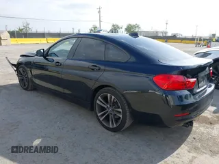 2015 BMW 4 Series 428i z VIN WBA4A9C5XFD416873, wystawiony jako IAAI lot #42108645 z przebiegiem 93 433 mil mil oraz . Historia ofert i sprzedaży dostępna na DreamBid. Obrazek 3.