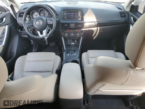 2014 Mazda CX-5 Grand Touring with VIN JM3KE4DYXE0377810, listed as a Copart auction lot 53071255 with 117,642 mi miles and Salvage Title. Bid and sale history available at DreamBid. Image 8.
