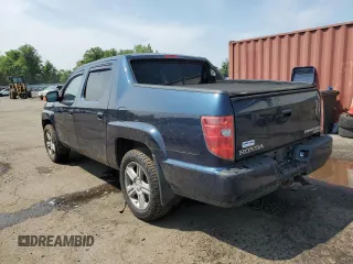 2010 Honda Ridgeline RTL with VIN 5FPYK1F5XAB004153, listed as a Copart auction lot 59710535 with Not provided miles and Salvage title. Bid and sale history available at DreamBid. Image 2.