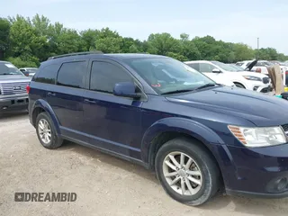 2017 Dodge Journey SXT z VIN 3C4PDDBG4HT574281, wystawiony jako IAAI lot #42273583 z przebiegiem 155 611 mil mil oraz . Historia ofert i sprzedaży dostępna na DreamBid. Obrazek 13.