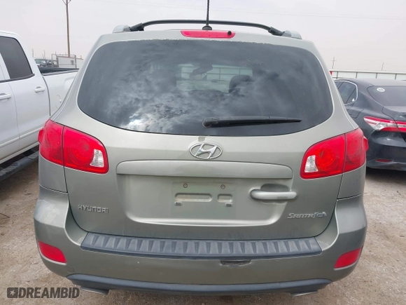 2009 Hyundai Santa Fe SE with VIN 5NMSH13E39H297907, listed as a IAAI auction lot 41708199 with 203,771 mi miles. Bid and sale history available at carsss.com. Image 16.