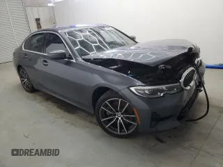 2019 BMW 3 Series 330i with VIN WBA5R1C56KFH04731, listed as a Copart auction lot 56854405 with 99,999 mi miles and Clean title. Bid and sale history available at DreamBid. Image 4.