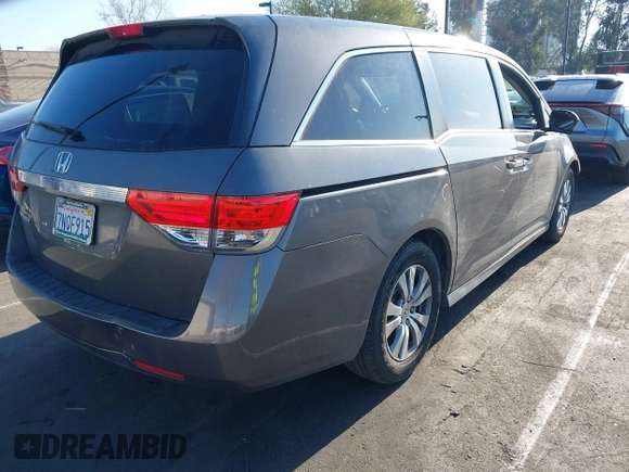 2015 Honda Odyssey EX-L with VIN 5FNRL5H61FB126933, listed as a IAAI auction lot 42003978 with 69,025 mi miles and . Bid and sale history available at carsss.com. Image 4.