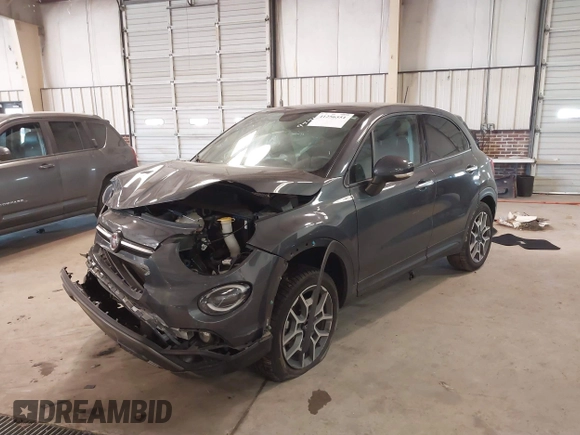 2021 FIAT 500X Trekking with VIN ZFBNF3B17MP909591, listed as a IAAI auction lot 41256551 with 58,688 mi miles and . Bid and sale history available at DreamBid. Image 17.