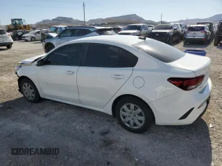 2022 Kia Rio LX with VIN 3KPA24AD5NE463323, listed as a Copart auction lot 52360084 with 17,581 mi miles and Salvage Title. Bid and sale history available at carsss.com. Image 2.