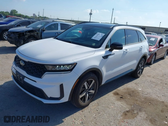 2021 Kia Sorento S with VIN 5XYRL4LC1MG002786, listed as a IAAI auction lot 42253503 with 90,893 mi miles and . Bid and sale history available at DreamBid. Image 2.