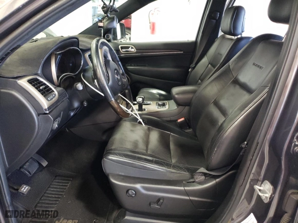 2014 Jeep Grand Cherokee Summit with VIN 1C4RJFJG5EC388545, listed as a Copart auction lot 68284754 with 189,897 mi miles and Salvage Title. Bid and sale history available at carsss.com. Image 7.