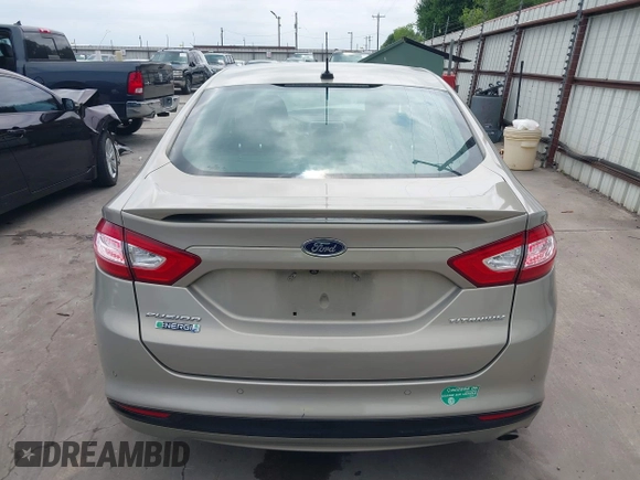 2015 Ford Fusion Energi Titanium with VIN 3FA6P0SU3FR114739, listed as a IAAI auction lot 42003011 with 120,553 mi miles. Bid and sale history available at carsss.com. Image 16.