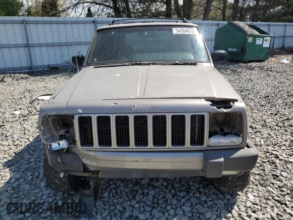 2000 Jeep Cherokee z VIN 1J4FF48S9YL220831, wystawiony jako Copart lot #54304615 z przebiegiem Nie podano mil oraz Szkoda całkowita • Salvage title. Historia ofert i sprzedaży dostępna na DreamBid. Obrazek 5.
