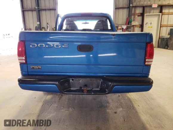 1999 Dodge Dakota SLT with VIN 1B7FL26X0XS298131, listed as a Copart auction lot 69590254 with 162,606 mi miles and Salvage Title. Bid and sale history available at carsss.com. Image 6.