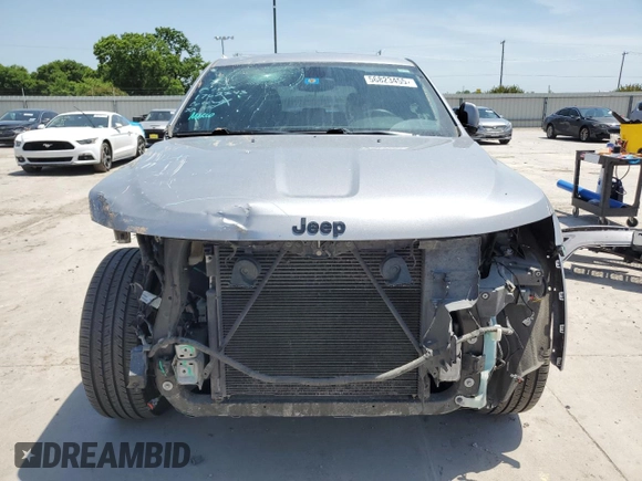 2018 Jeep Grand Cherokee Laredo with VIN 1C4RJFAG4JC272683, listed as a Copart auction lot 56823455 with 122,778 mi miles and Salvage title. Bid and sale history available at DreamBid. Image 5.