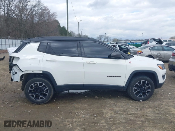 2019 Jeep Compass Trailhawk with VIN 3C4NJDDB0KT733175, listed as a IAAI auction lot 41724527 with 82,574 mi miles and . Bid and sale history available at carsss.com. Image 14.
