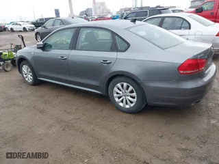 2014 Volkswagen Passat Wolfsburg Ed with VIN 1VWAT7A37EC100581, listed as a IAAI auction lot 41535884 with 119,169 mi miles. Bid and sale history available at carsss.com. Image 3.