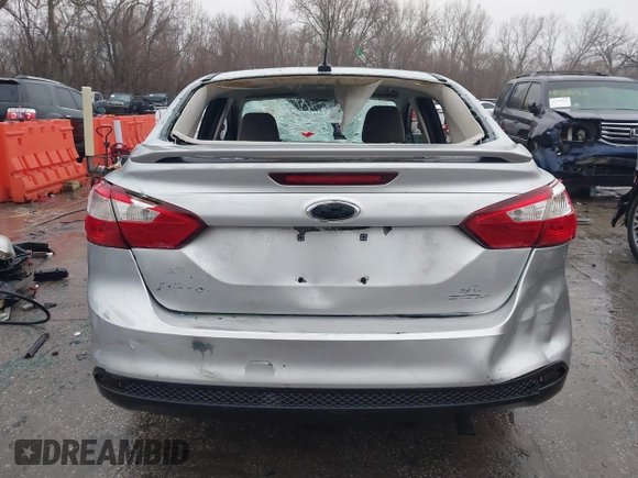 2013 Ford Focus SE z VIN 1FADP3F28DL107069, wystawiony jako IAAI lot #41412256 z przebiegiem 160 727 mil mil oraz . Historia ofert i sprzedaży dostępna na DreamBid. Obrazek 16.