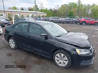 2014 Volkswagen Jetta Sedan SE w/Connectivity/Sunroof PZEV with VIN 3VWD17AJ1EM409253, listed as a IAAI auction lot 42035819 with 146,903 mi miles. Bid and sale history available at carsss.com. Image 1.