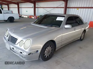 2001 Mercedes-Benz E-Class with VIN WDBJF65J81B215945, listed as a IAAI auction lot 41707410 with 227,668 mi miles. Bid and sale history available at carsss.com. Image 2.
