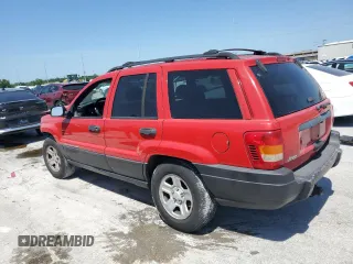 1999 Jeep Grand Cherokee Laredo z VIN 1J4G258SXXC518308, wystawiony jako Copart lot #56636235 z przebiegiem 233 649 mil mil oraz Szkoda całkowita • Salvage title. Historia ofert i sprzedaży dostępna na DreamBid. Obrazek 2.