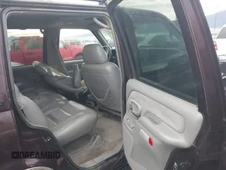 1997 GMC Yukon with VIN 1GKEK13R0VJ755574, listed as a IAAI auction lot 41158932 with 212,668 mi miles. Bid and sale history available at carsss.com. Image 8.