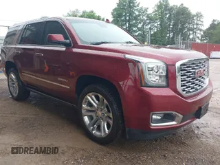 2020 GMC Yukon Denali with VIN 1GKS2CKJ5LR129592, listed as a IAAI auction lot 39806304 with 71,125 mi miles. Bid and sale history available at carsss.com. Image 1.