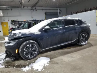2022 Kia EV6 Wind with VIN KNDC3DLC3N5039189, listed as a Copart auction lot 44153715 with 57,897 mi miles and Salvage Title. Bid and sale history available at carsss.com. Image 1.
