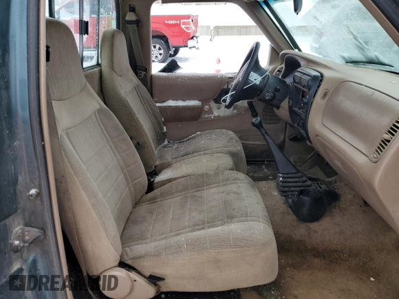 1997 Ford Ranger XLT with VIN 1FTCR10AXVUD48518, listed as a Copart auction lot 41518815 with 400,246 mi miles and Salvage title. Bid and sale history available at DreamBid. Image 7.