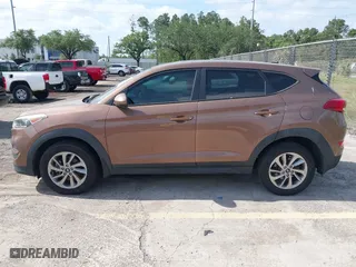 2016 Hyundai Tucson SE with VIN KM8J23A4XGU180300, listed as a IAAI auction lot 42123067 with 123,804 mi miles. Bid and sale history available at carsss.com. Image 14.