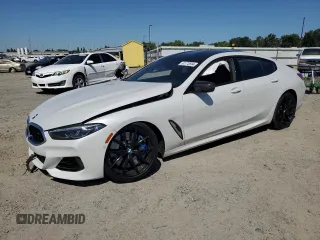2023 BMW 8 Series M850i with VIN WBAGV8C0XPCK39846, listed as a Copart auction lot 61173594 with 0 mi miles and Salvage Title. Bid and sale history available at carsss.com. Image 1.