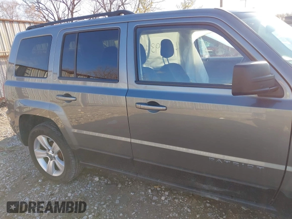 2013 Jeep Patriot Latitude with VIN 1C4NJPFA1DD169521, listed as a IAAI auction lot 41812936 with 133,088 mi miles. Bid and sale history available at carsss.com. Image 13.