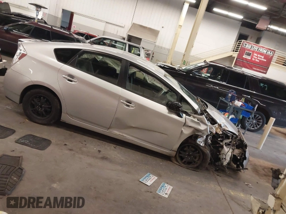 2013 Toyota Prius One z VIN JTDKN3DU5D5674730, wystawiony jako IAAI lot #40989694 z przebiegiem 159 236 mil mil oraz . Historia ofert i sprzedaży dostępna na DreamBid. Obrazek 1.