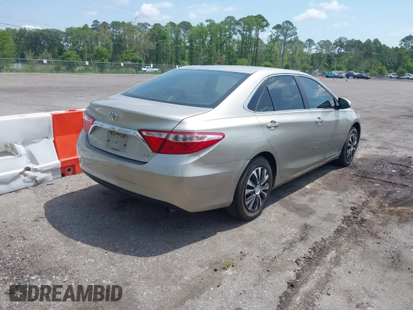 2016 Toyota Camry XLE with VIN 4T1BF1FKXGU259860, listed as a IAAI auction lot 42219507 with 239,145 mi miles and . Bid and sale history available at DreamBid. Image 4.
