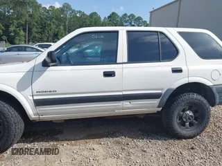 1998 Isuzu Rodeo with VIN 4S2CK58D3W4301606, listed as a IAAI auction lot 42453329 with 219,433 mi miles and . Bid and sale history available at DreamBid. Image 14.