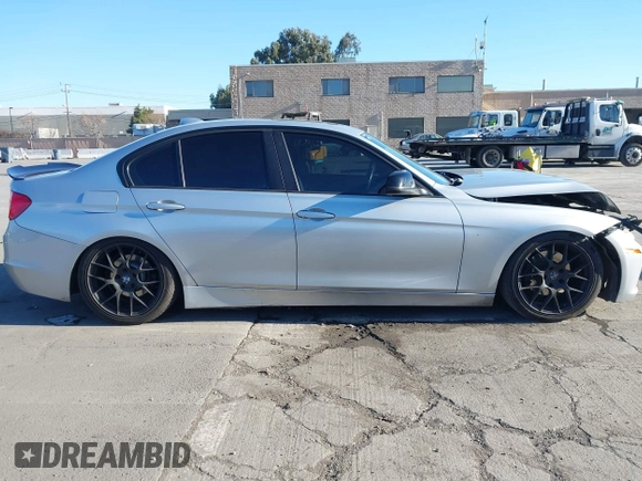2015 BMW 3 Series 328i with VIN WBA3A5C57FF609054, listed as a IAAI auction lot 41330498 with 129,378 mi miles. Bid and sale history available at carsss.com. Image 13.
