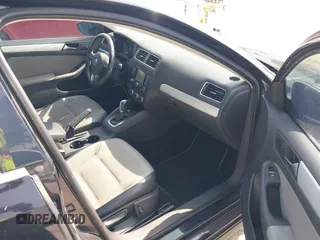 2013 Volkswagen Jetta Hybrid SE z VIN 3VW637AJXDM226189, wystawiony jako IAAI lot #42503588 z przebiegiem 158 367 mil mil oraz . Historia ofert i sprzedaży dostępna na DreamBid. Obrazek 5.