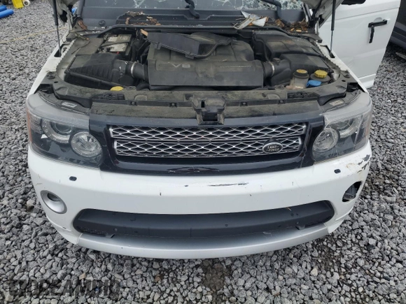 2013 Land Rover Range Rover Sport SC z VIN SALSH2E48DA803737, wystawiony jako Copart lot #50303275 z przebiegiem 127 712 mil mil oraz Szkoda całkowita • Salvage title. Historia ofert i sprzedaży dostępna na DreamBid. Obrazek 12.