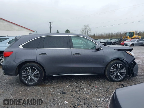 2019 Acura MDX Technology с VIN 5J8YD4H55KL025610, выставлен на аукционе IAAI как лот 41966324 с пробегом 96 877 миль миль и . История ставок и продаж доступна на DreamBid. Изображение 13.