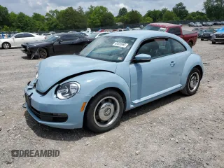 2012 Volkswagen Beetle 2.5L PZEV with VIN 3VWJP7AT1CM652044, listed as a Copart auction lot 60855665 with 49,481 mi miles and Clean title. Bid and sale history available at DreamBid. Image 1.